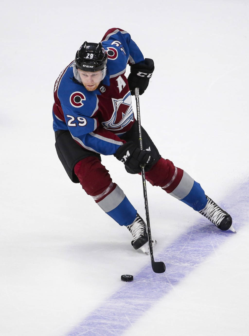 Skating On Ice Nathan Mackinnon Wallpaper