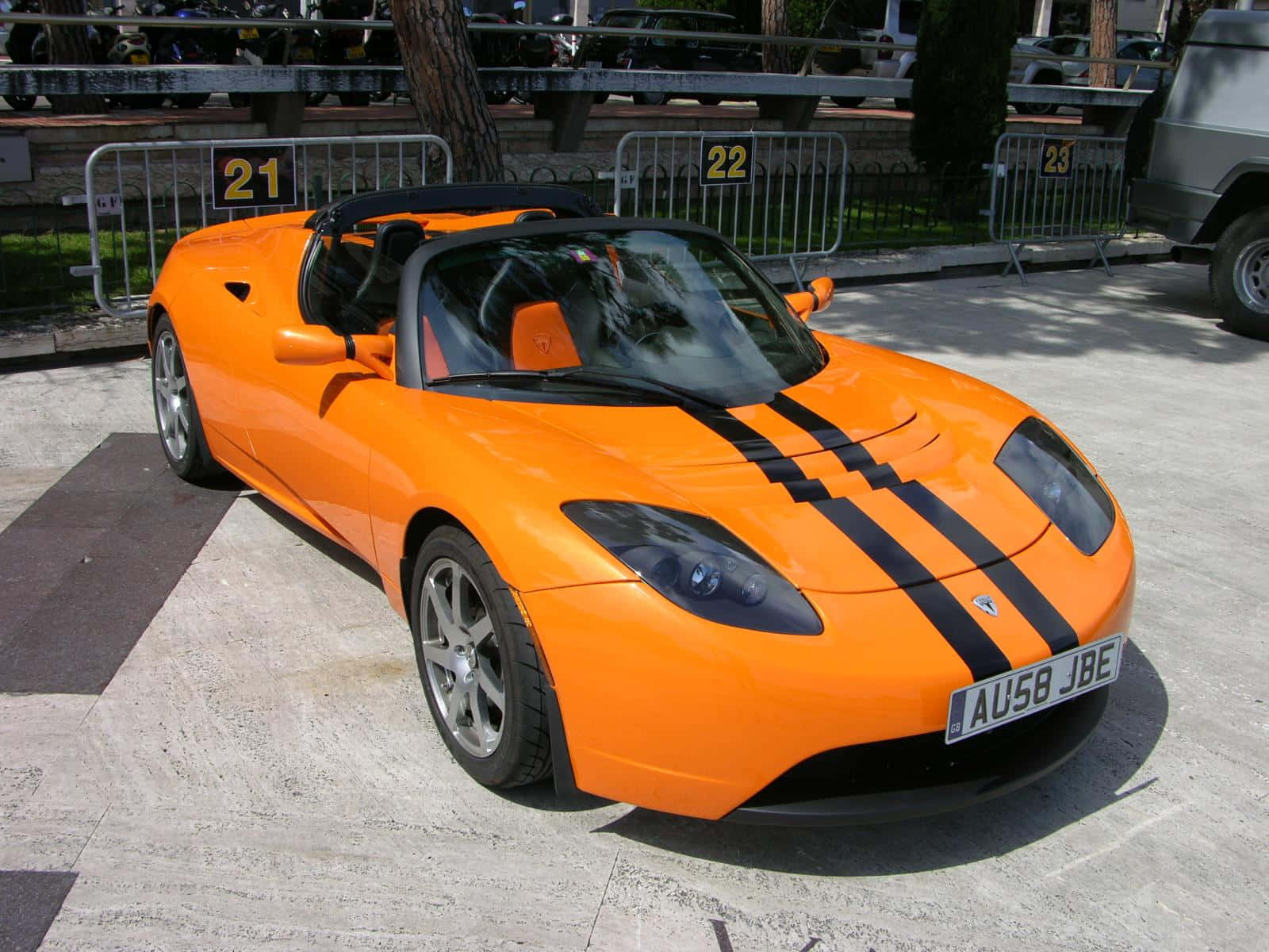 Sleek Elegance - Tesla Roadster In Style Wallpaper