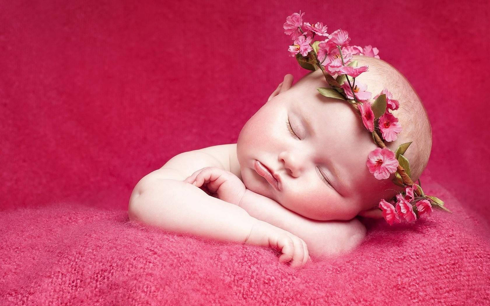 Sleeping Baby In Pink Blanket Wallpaper