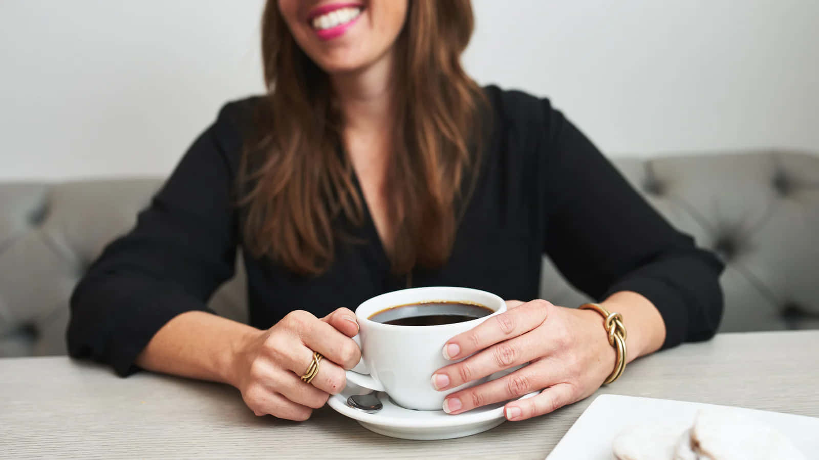 Smiling Woman Enjoying Morning Coffee.jpg Wallpaper