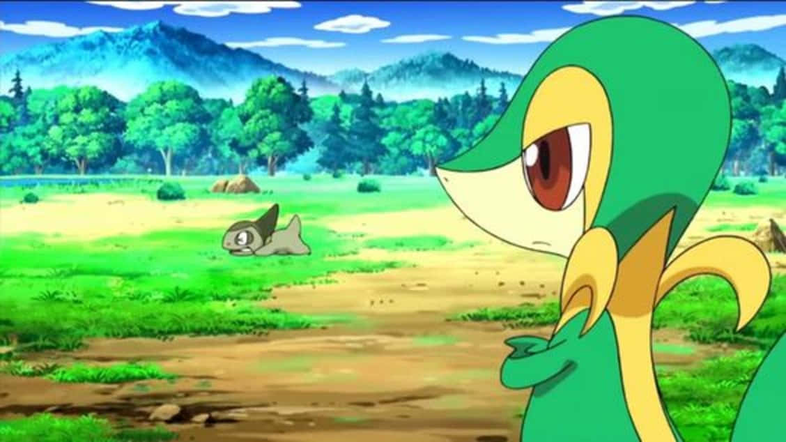 Snivy Engages With Axew In A Pokemon Adventure Wallpaper