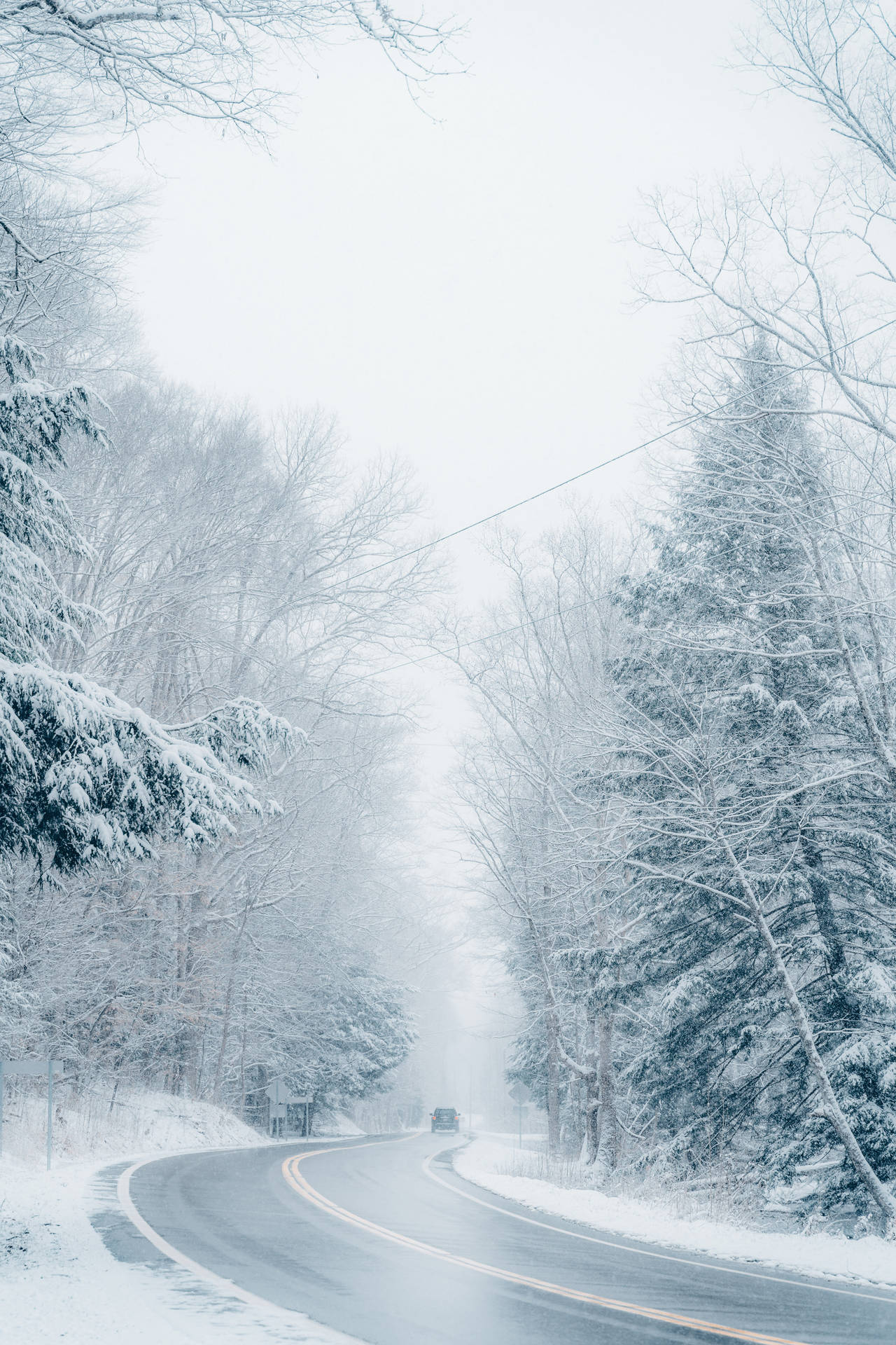 Snow Covered Road During Cool Winter Wallpaper
