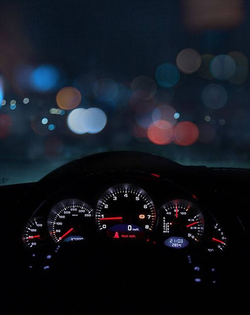 Speedtest Display On A Car Dashboard At Night Wallpaper