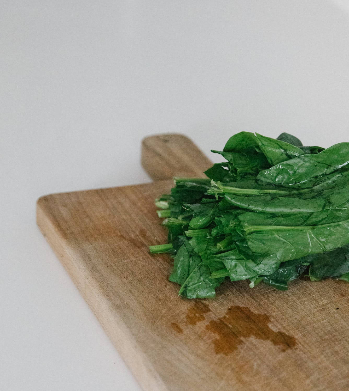 Spinach On Wooden Board Wallpaper