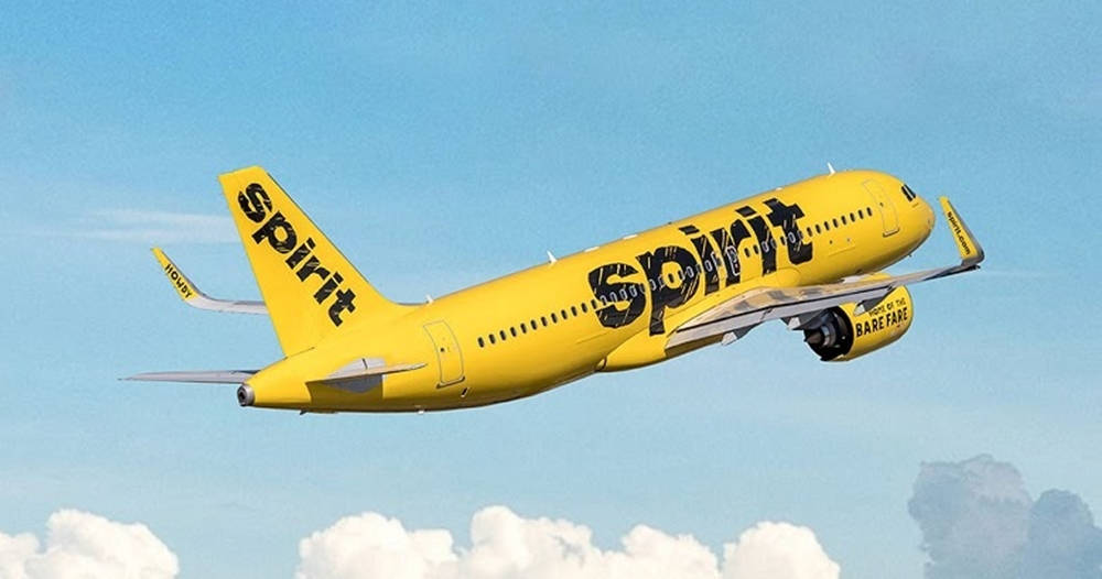 Spirit Airlines Bright Yellow Aircraft On Runway Wallpaper