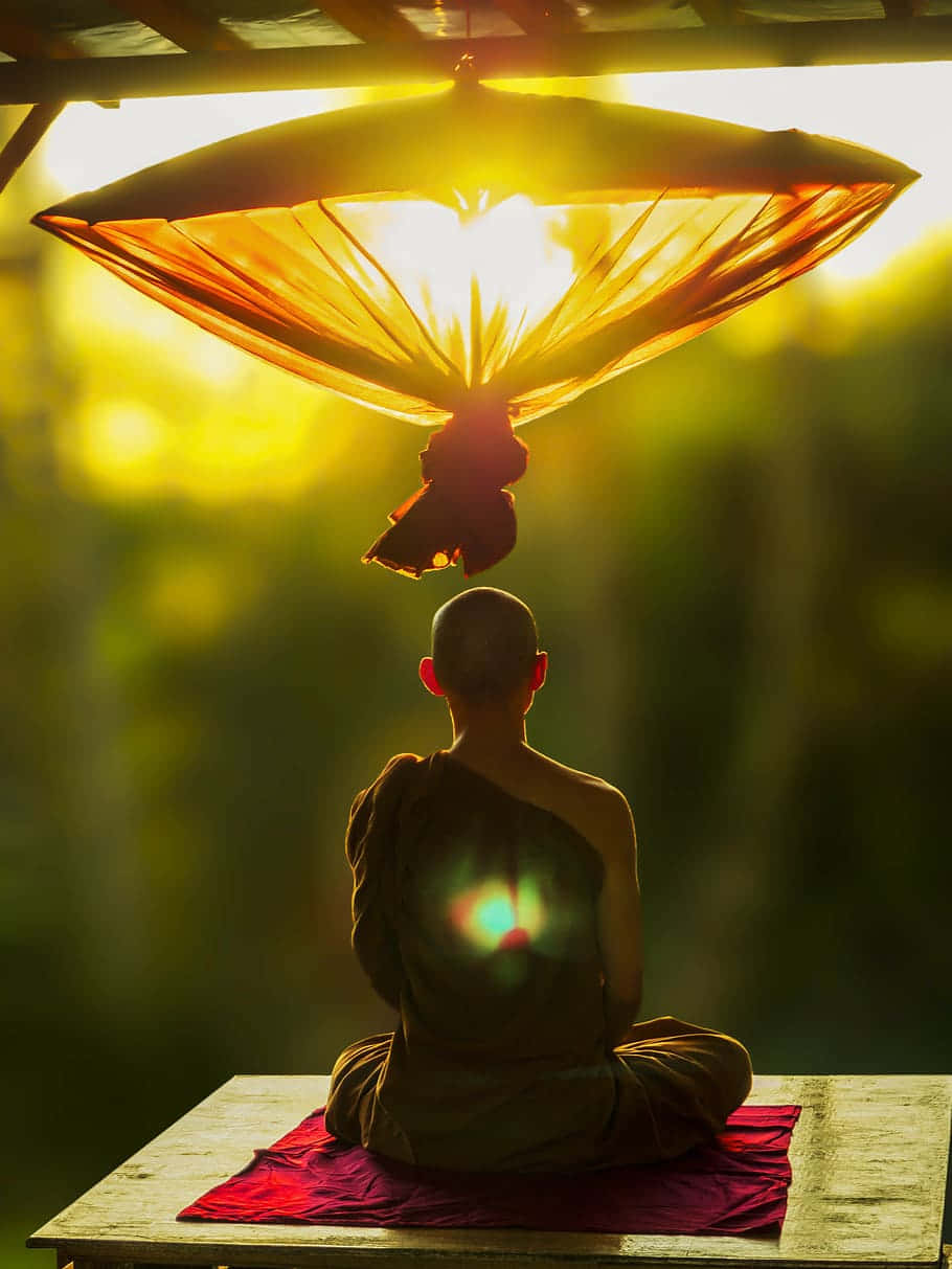 Spiritual Meditation In A Serene Nature Setting Wallpaper