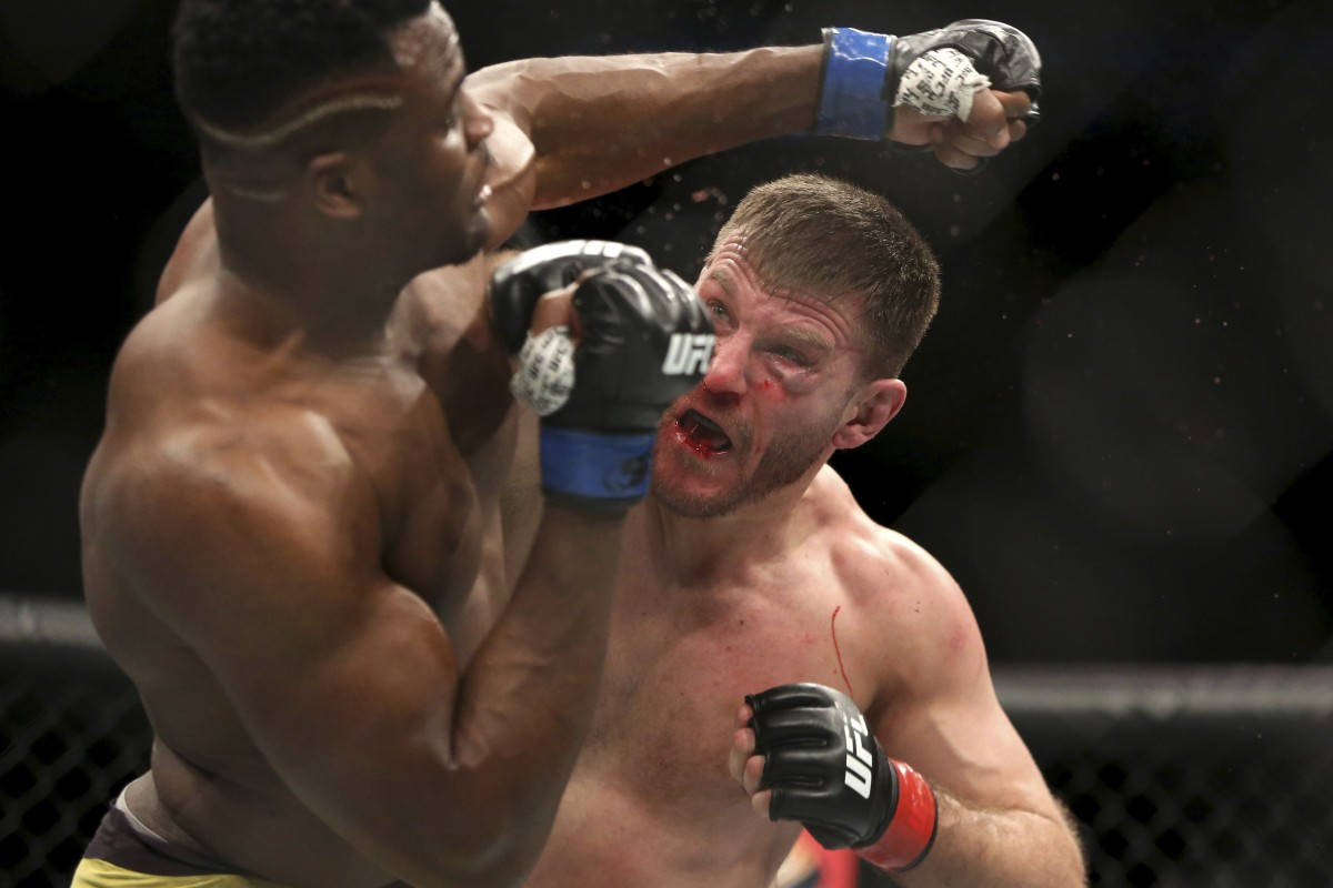 Stipe Miocic Evading Left Hook Wallpaper