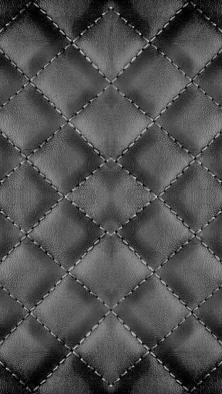 Stitched Upholstery Made Of Black Leather Iphone Wallpaper