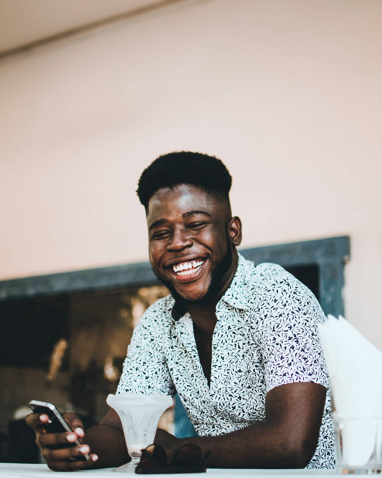 Stolen Shot Of A Smiling Black Man Wallpaper