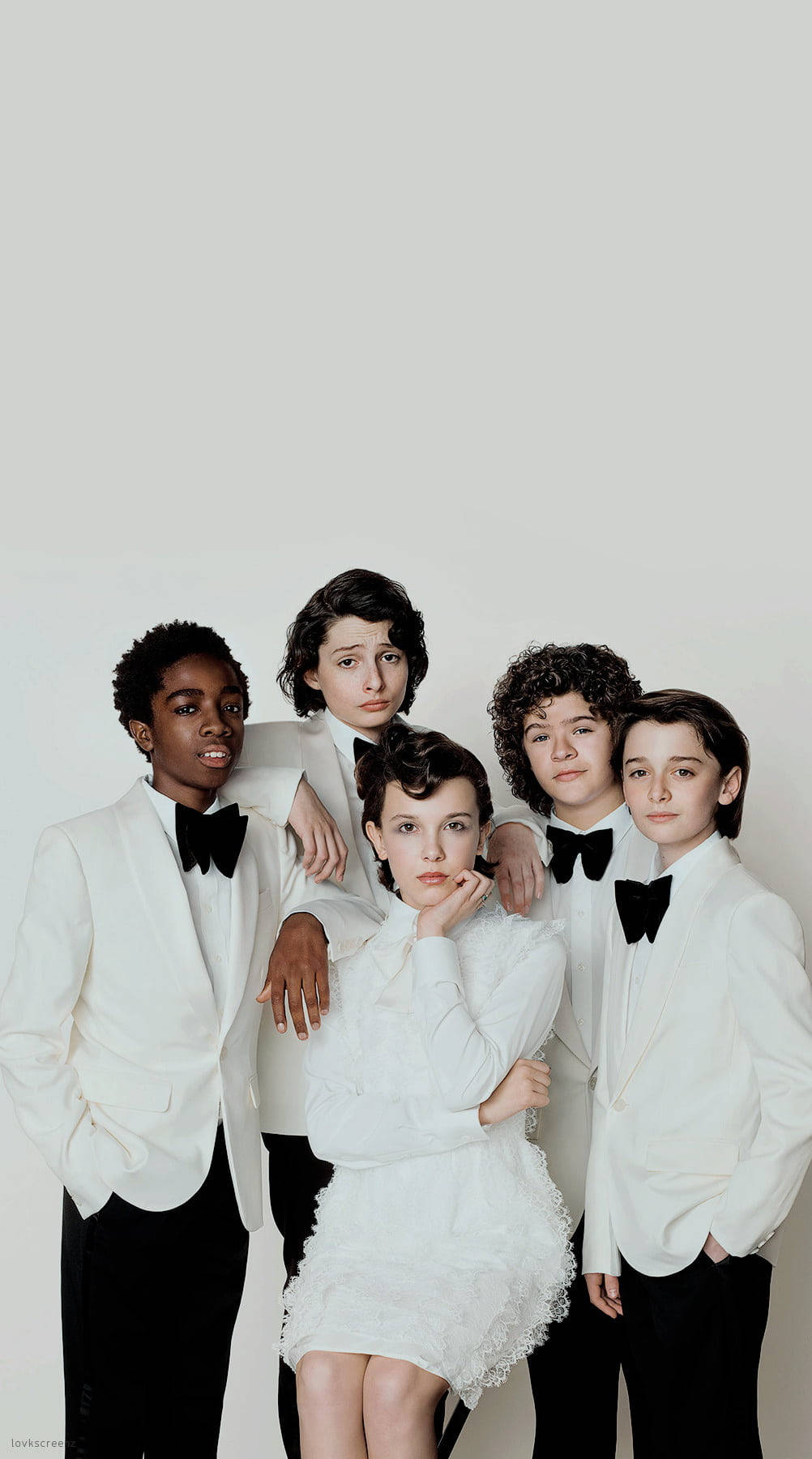 Stranger Things Cast In White Attire Wallpaper