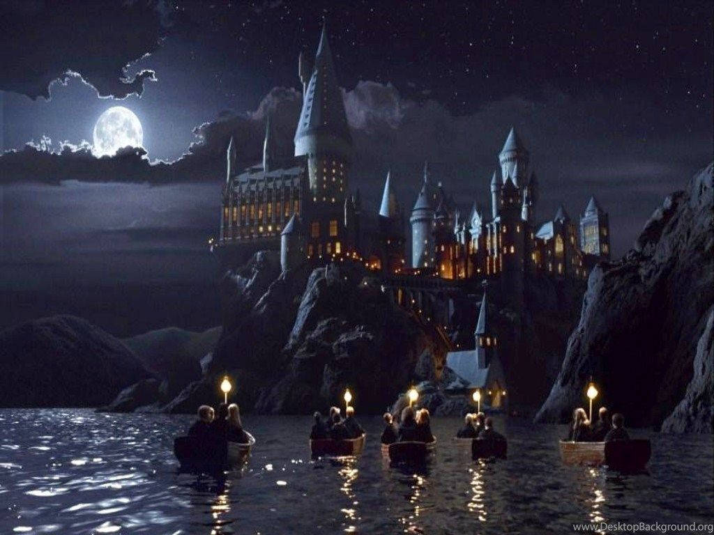 Students On Boats Hogwarts Wallpaper