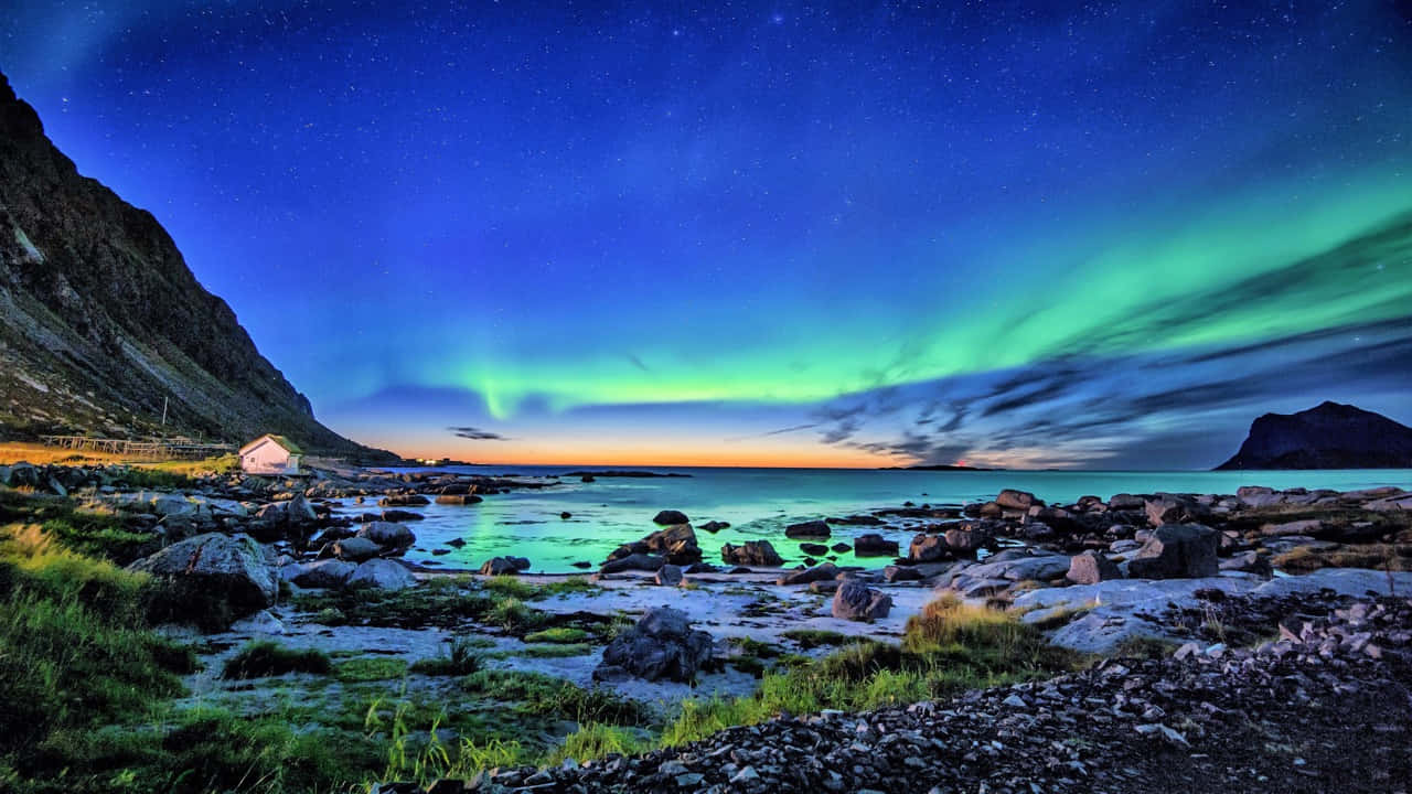 Stunning Aurora Borealis In The Night Sky Wallpaper