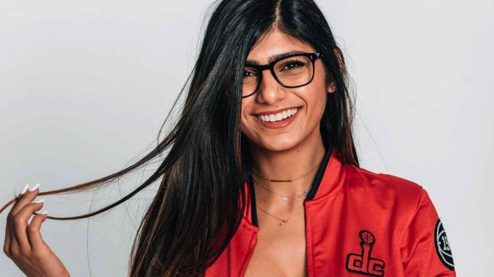 Stunning Mia Khalifa In Red Jacket Wallpaper