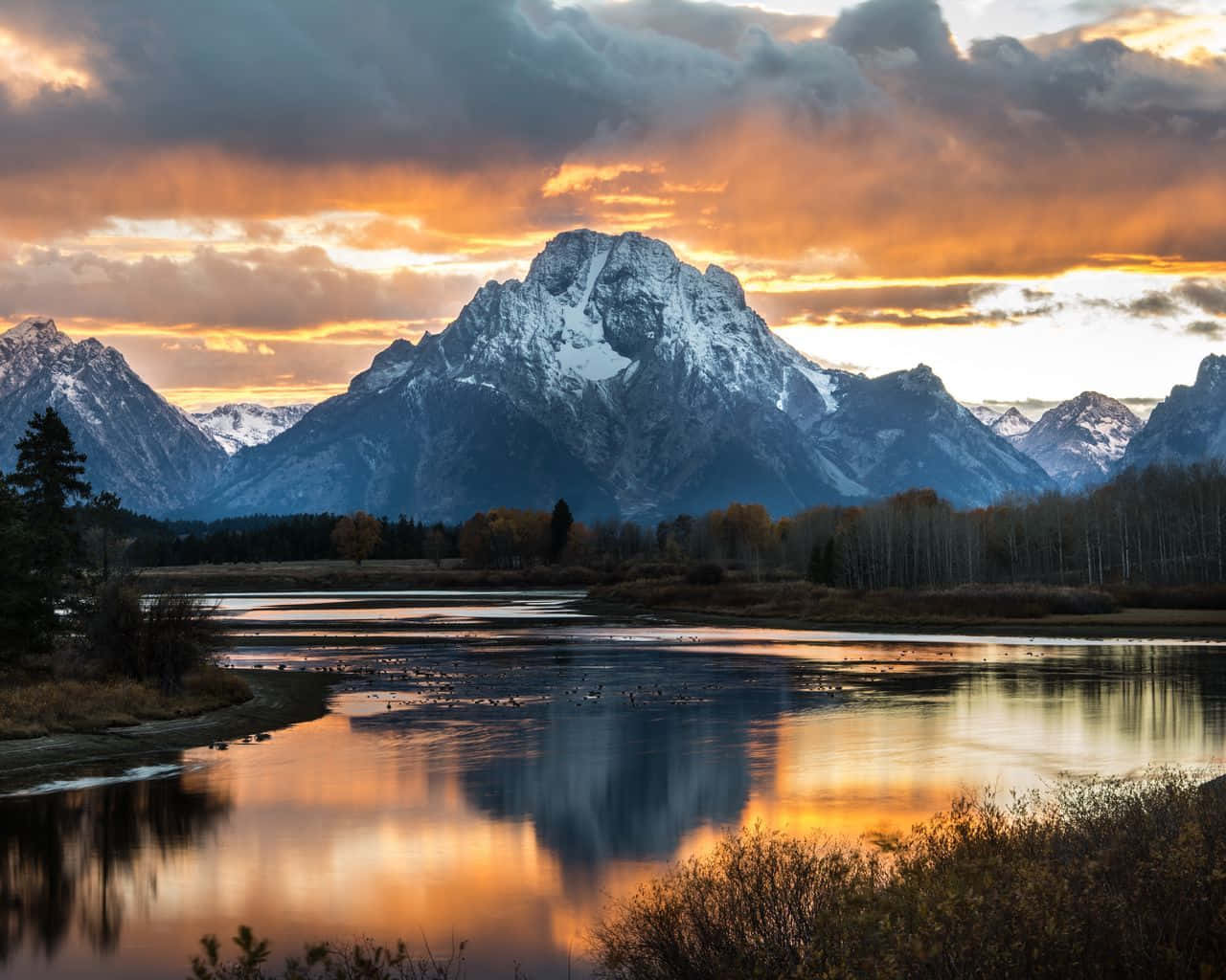 Sunset Over The Grand Teton Mountains Wallpaper