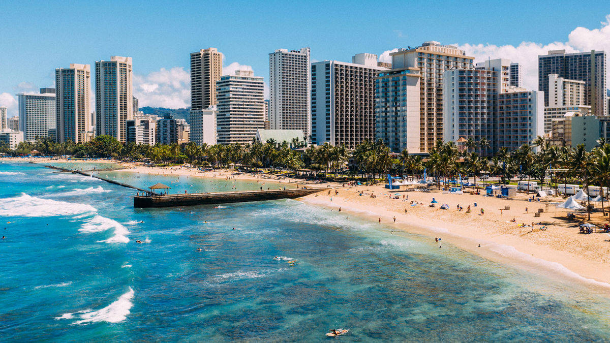 Tall Buildings Along Oahu Beach Wallpaper