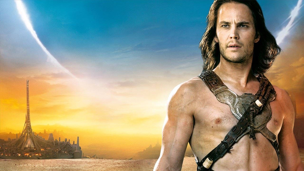 Taylor Kitsch As John Carter In Action Wallpaper