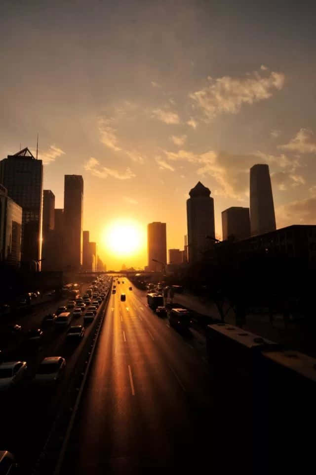 The Beauty Of The City Skyline At Sunset Wallpaper