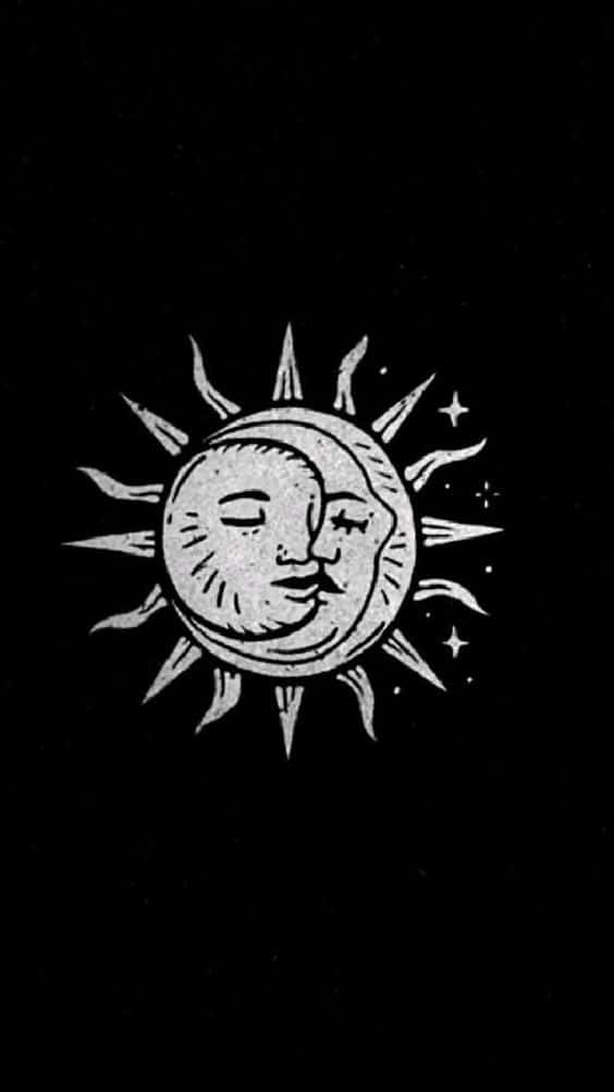 The Celestial Dance Of The Sun And Moon Wallpaper