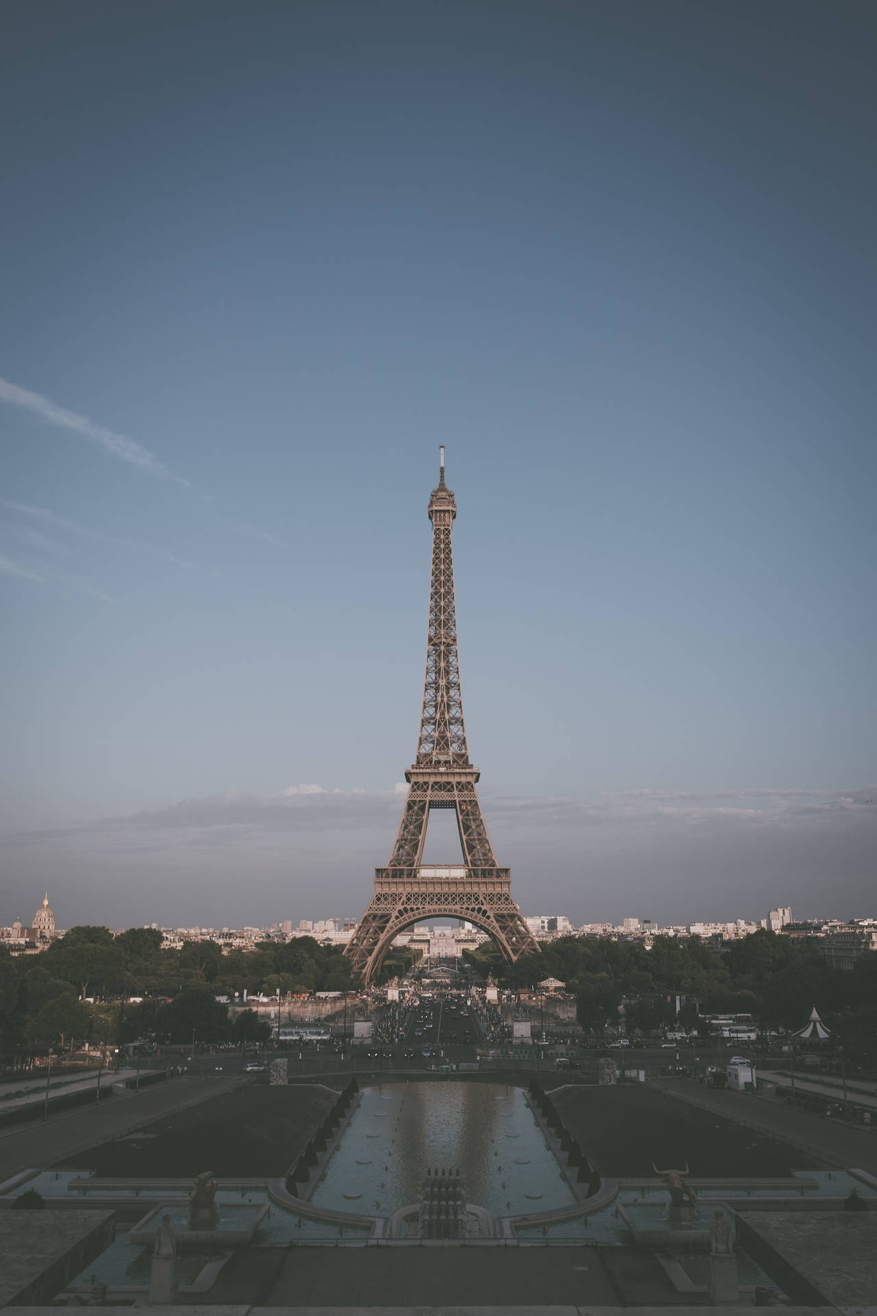 The Eiffel Tower Stands Out In The Classic Skyline Of Paris Wallpaper