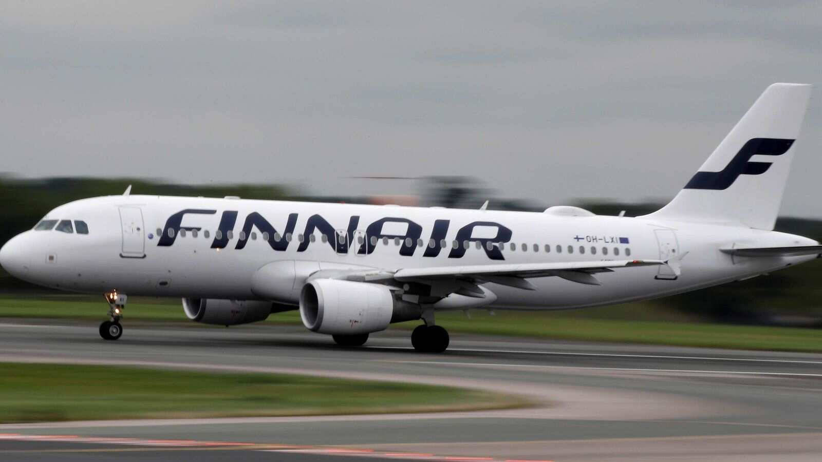 The Pristine Finnair Aircraft On The Runway Wallpaper