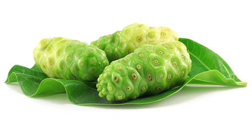 Three Ripe Noni Fruits On A Leaf Wallpaper