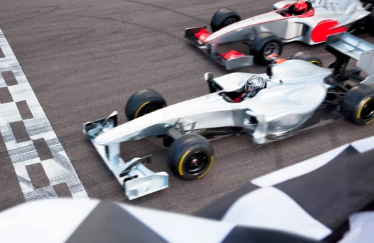 Thrilling Finish Line Racetrack - F1 4k Wallpaper