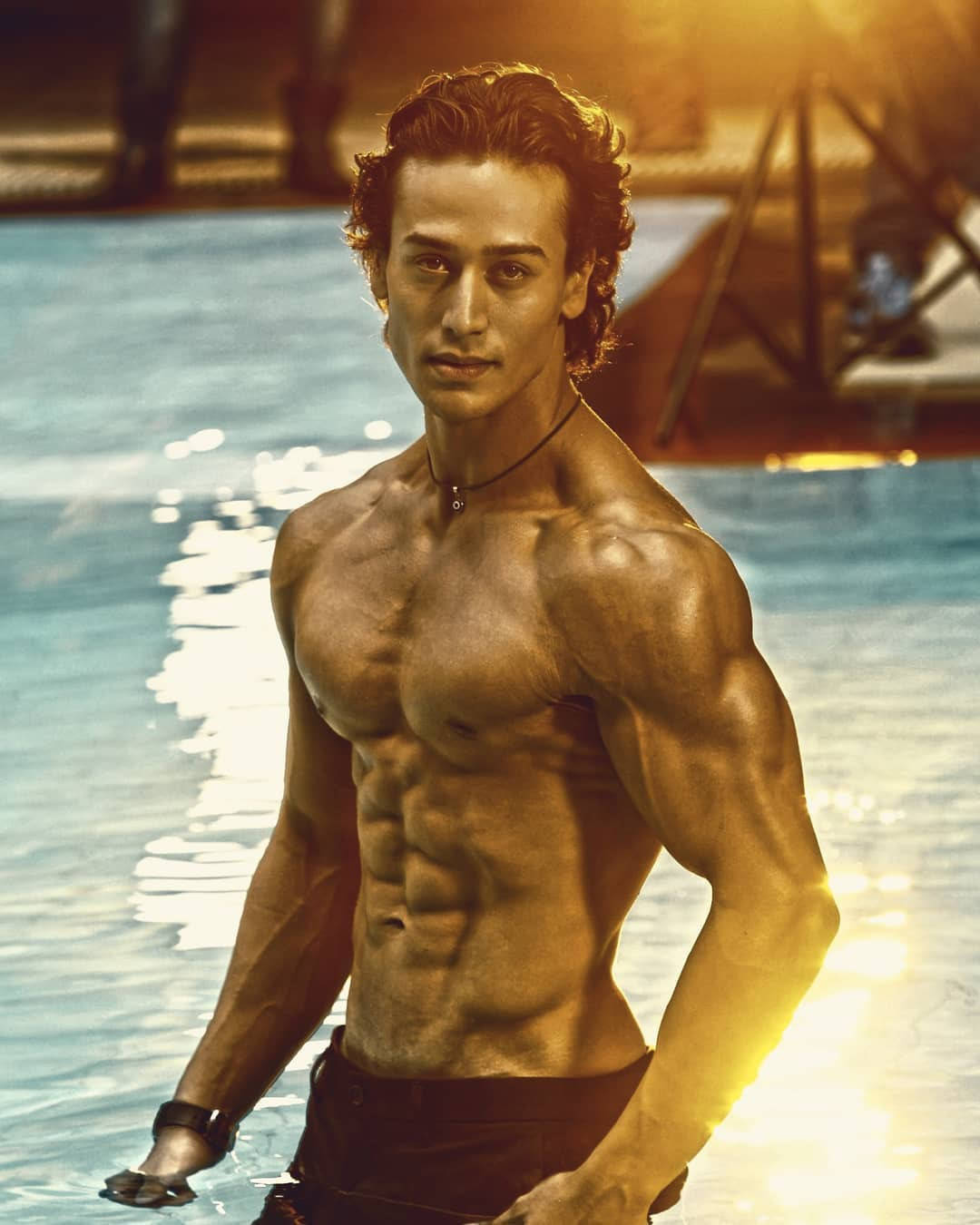 Tiger Shroff Body Glistening Outdoors Wallpaper