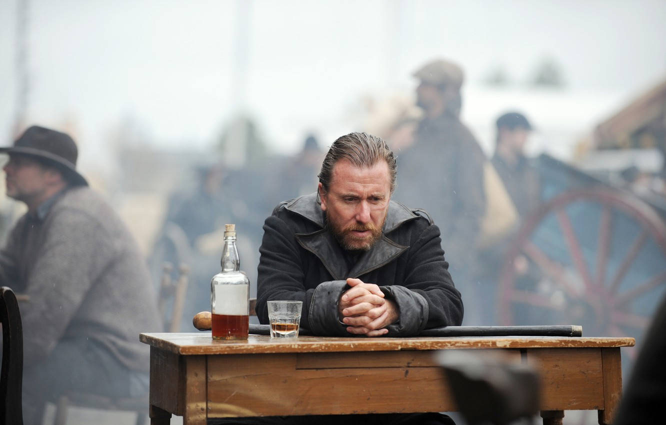 Tim Roth As Death Larsen Drinking Alone Wallpaper