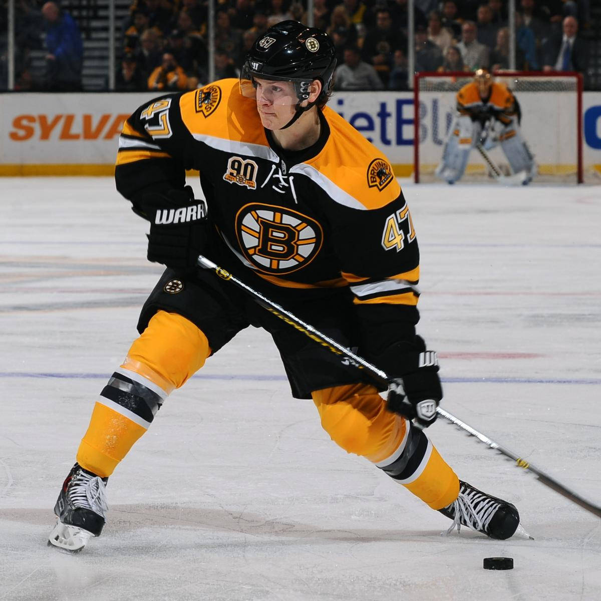 Torey Krug Maneuvering The Puck During An Nhl Game, November 2014 Wallpaper