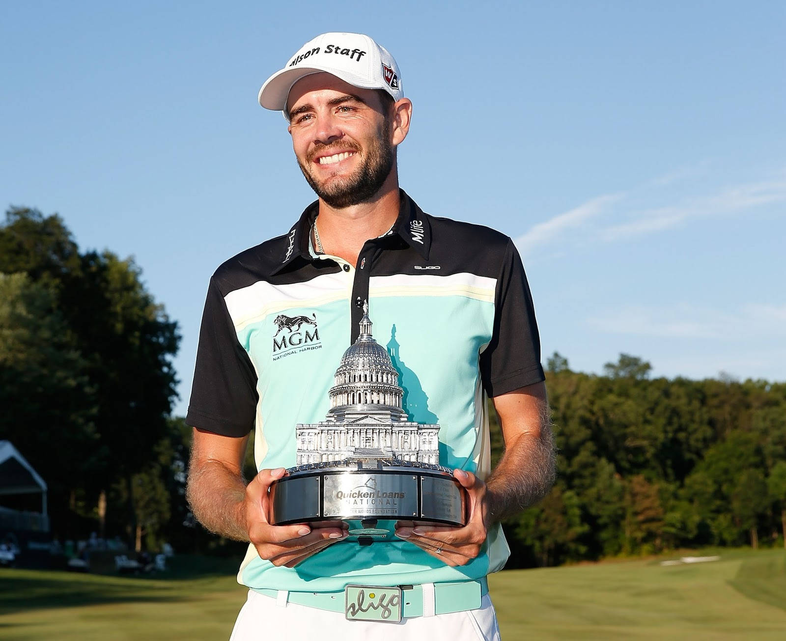 Troy Merritt Holding Trophy Proudly Wallpaper