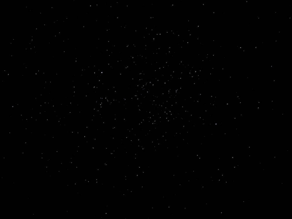 Twinkling Stars On Blank Black Sky Wallpaper