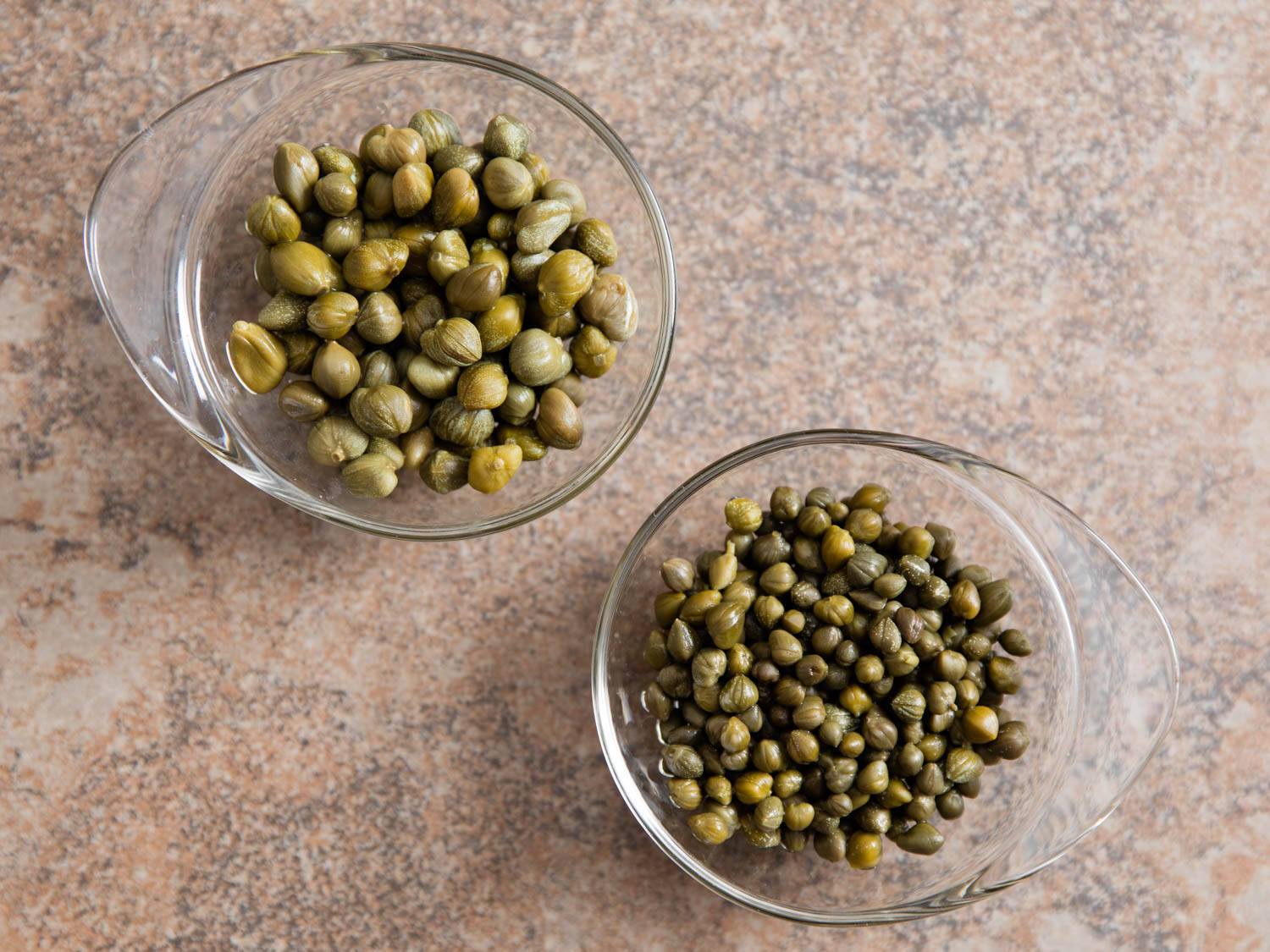 Two Glass Bowls Of Capers Wallpaper