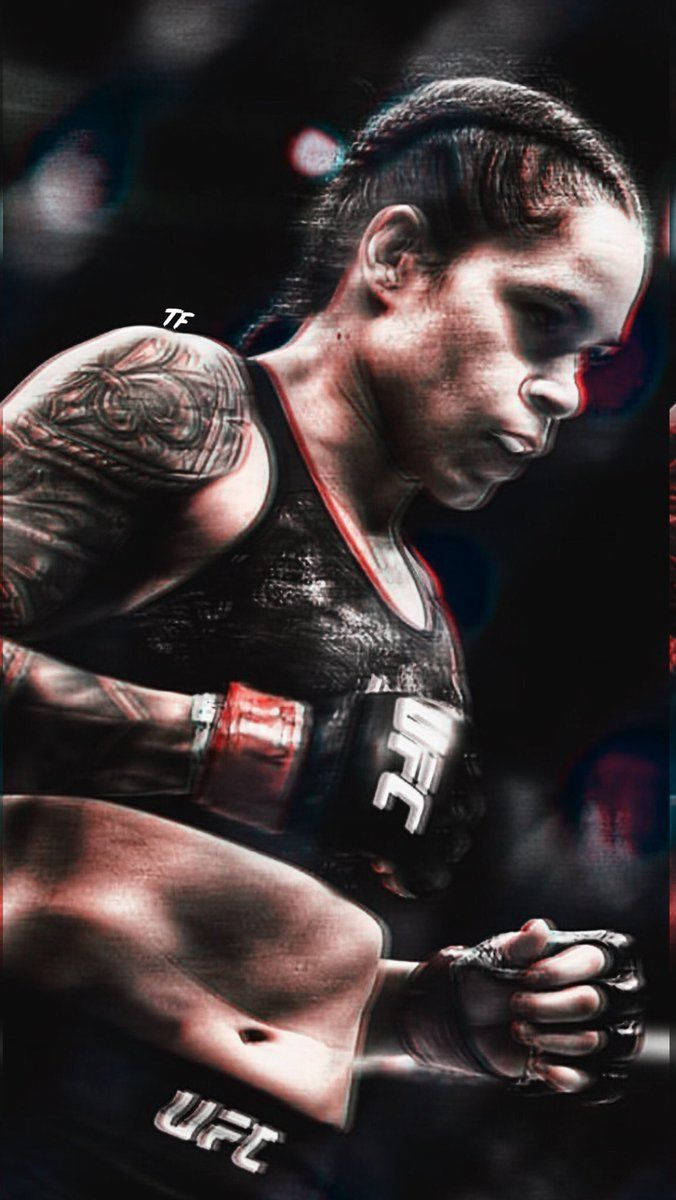 Ufc Champion Amanda Nunes In Action Wallpaper