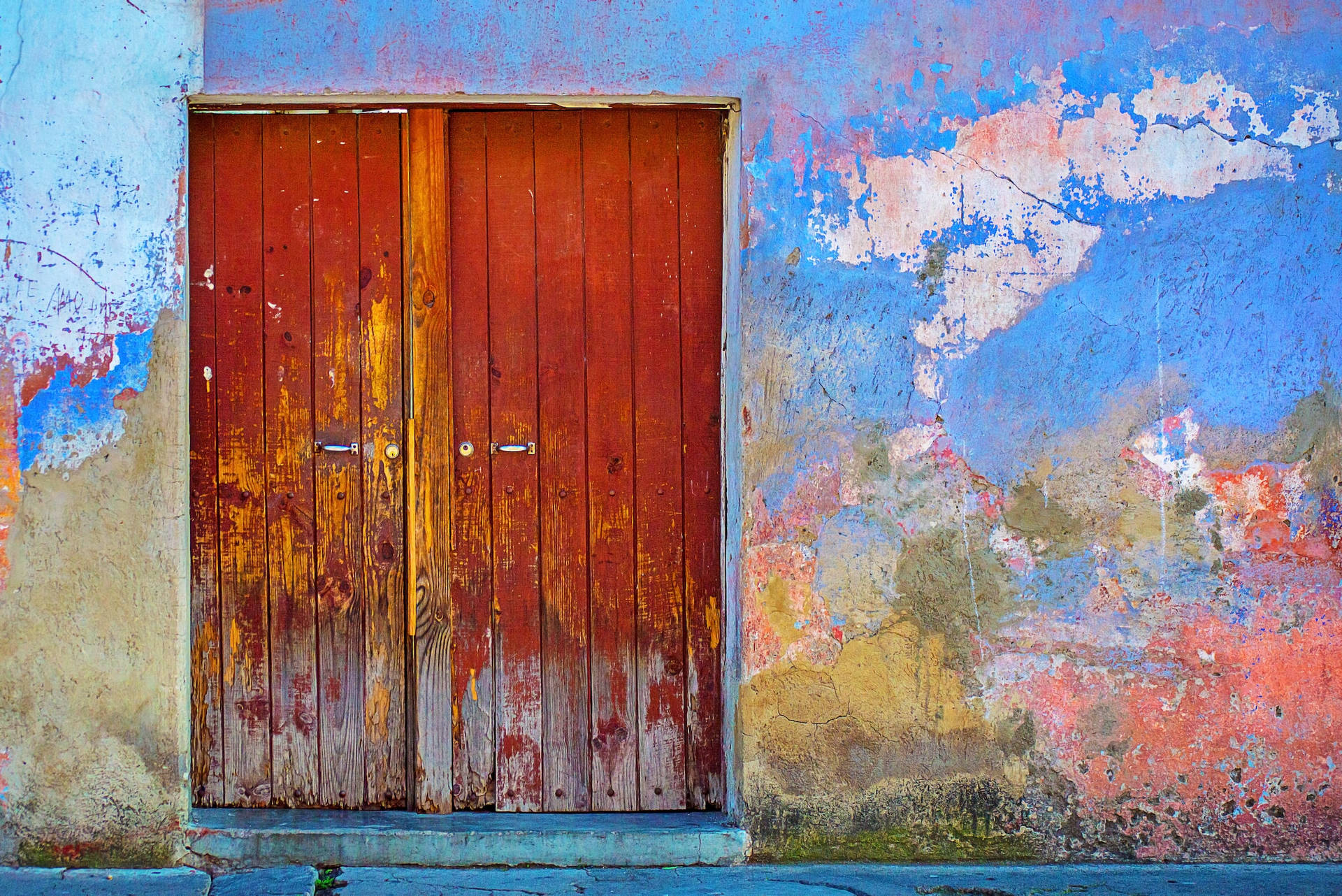 Unique Door In Rust Yellow Hues Wallpaper