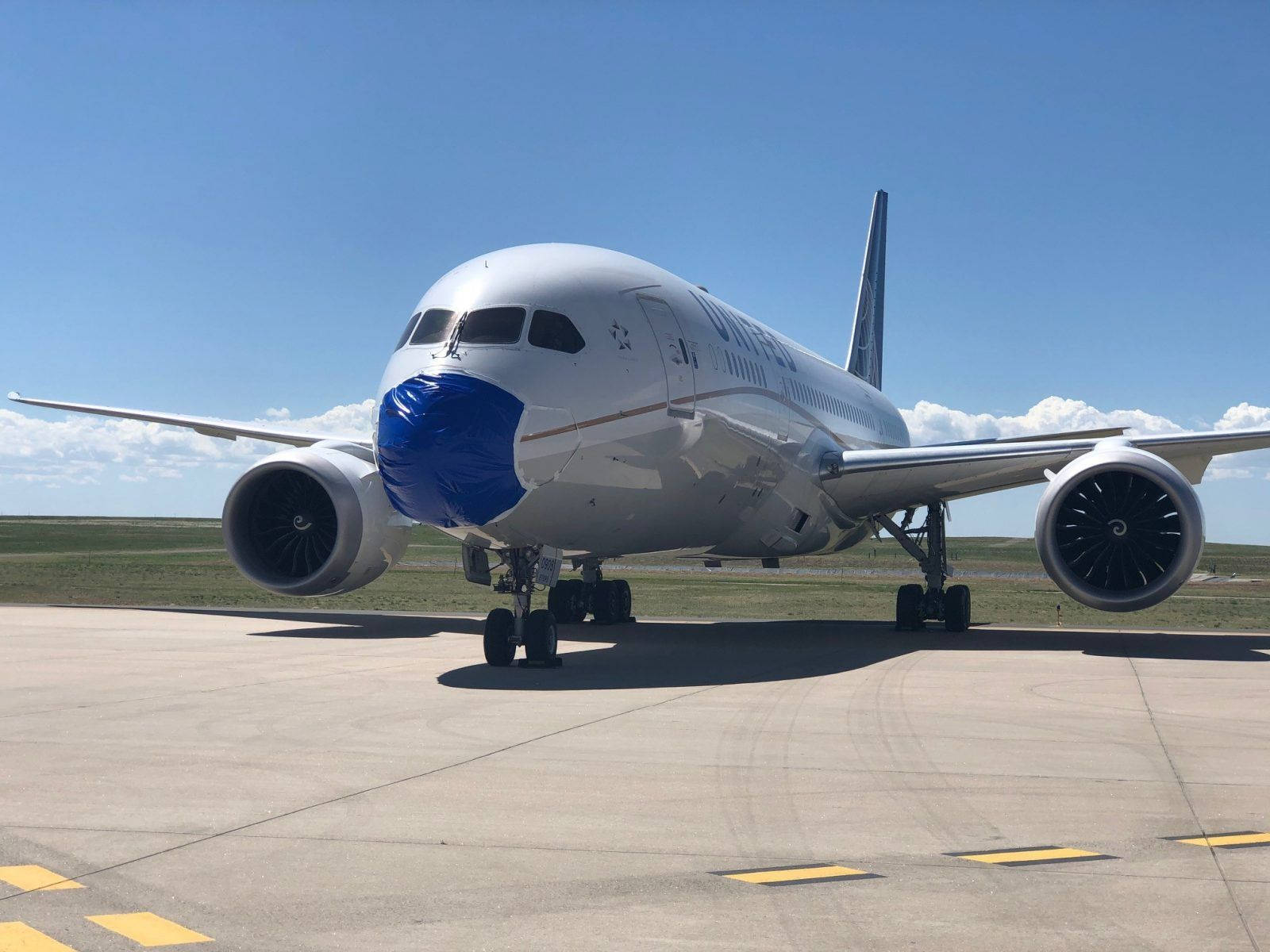 United Airlines Plane Parked At Flight Ramp Wallpaper