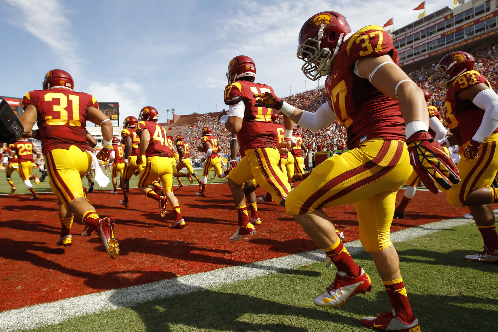 Usc Trojans Football Players In Action Wallpaper
