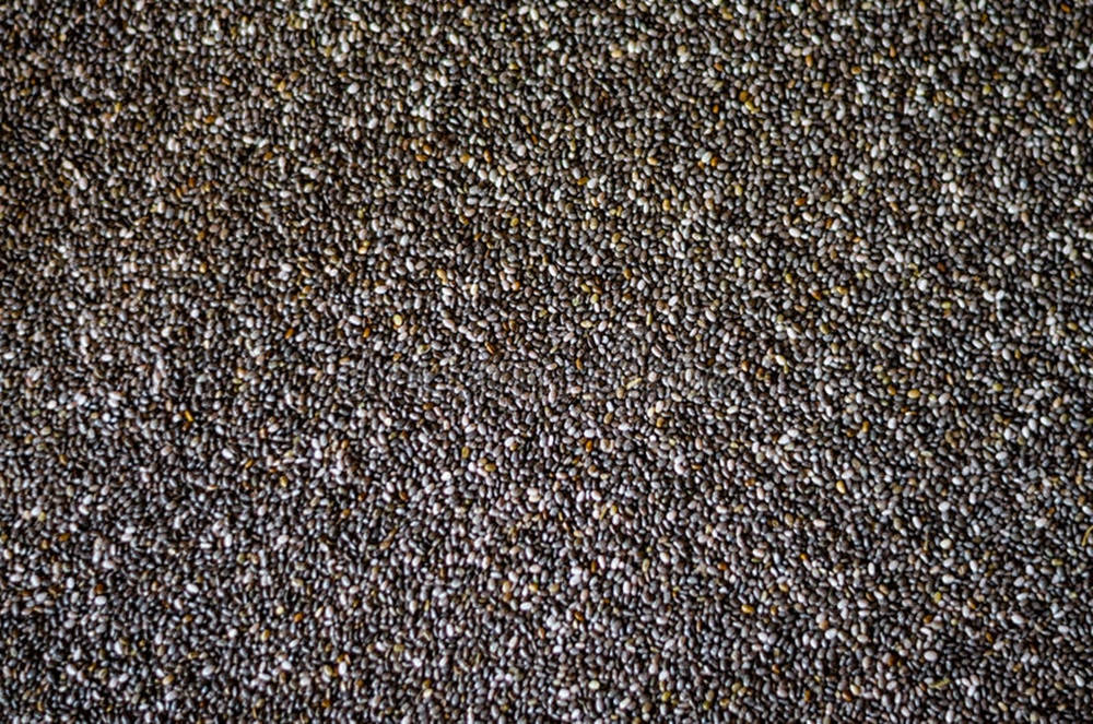 Vibrant Display Of Nutritious Chia Seeds Wallpaper