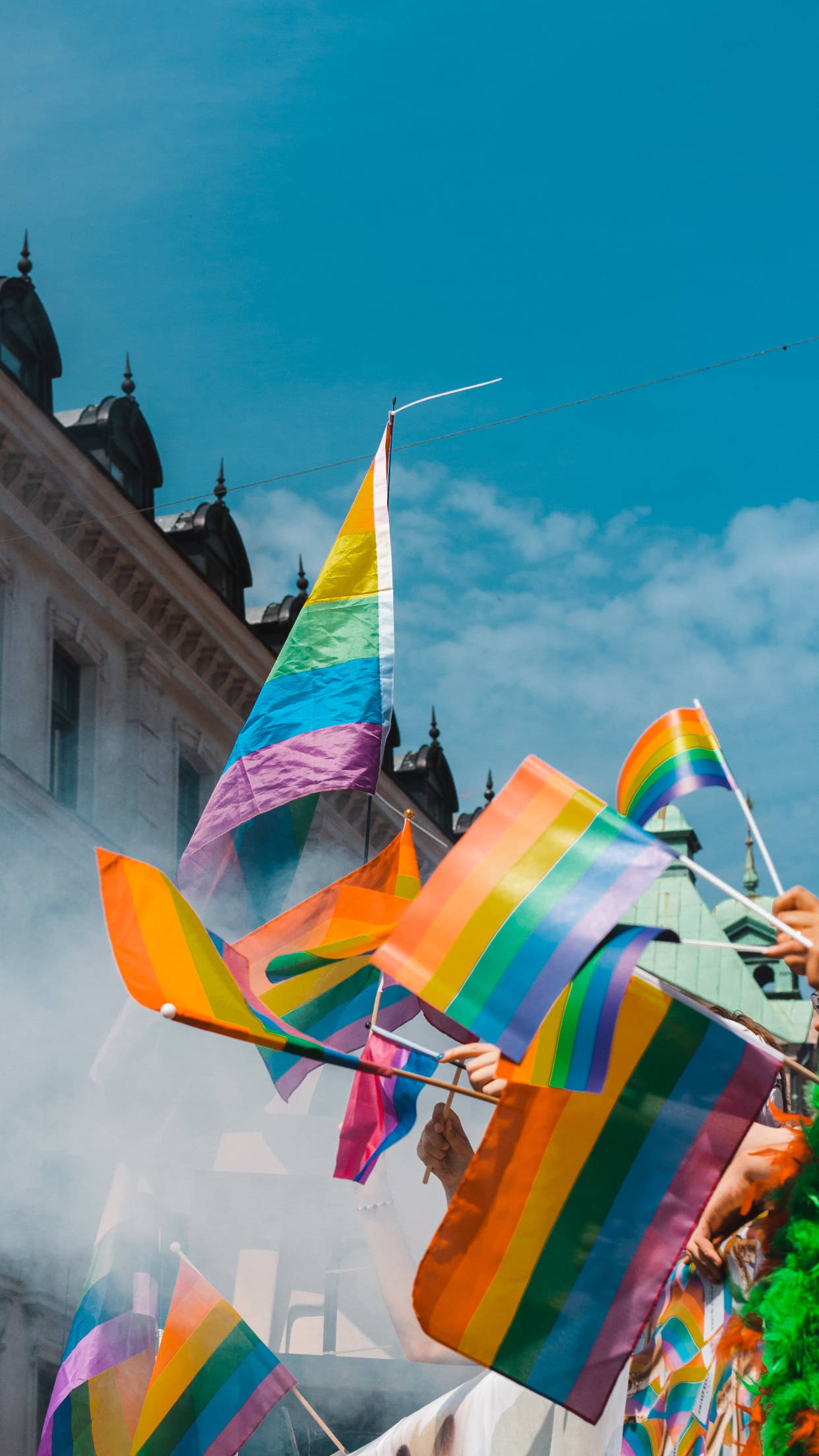 Vibrant Lgbt Pride Flags On Phone Screen Wallpaper