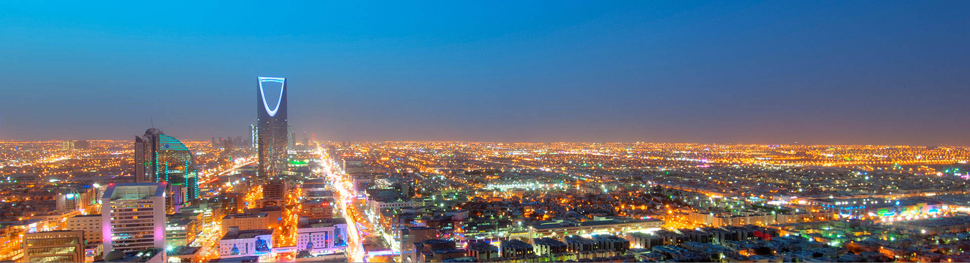 Vibrant Skyline Of Riyadh At Night Wallpaper