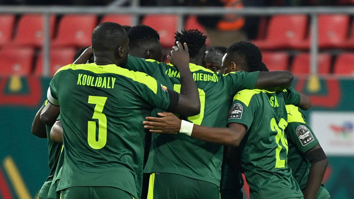 Victorious Senegal National Football Team Celebrating At Africa Cup Wallpaper