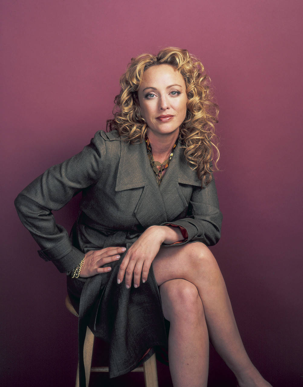 Virginia Madsen Looking Elegant In Grey Coat Wallpaper