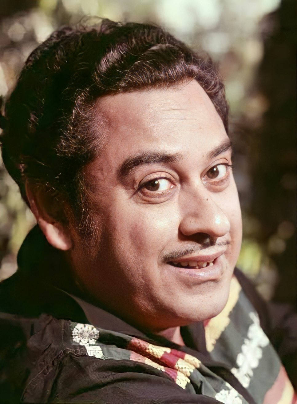 Vision Of A Legend - Kishore Kumar Gazing Into The Camera Wallpaper