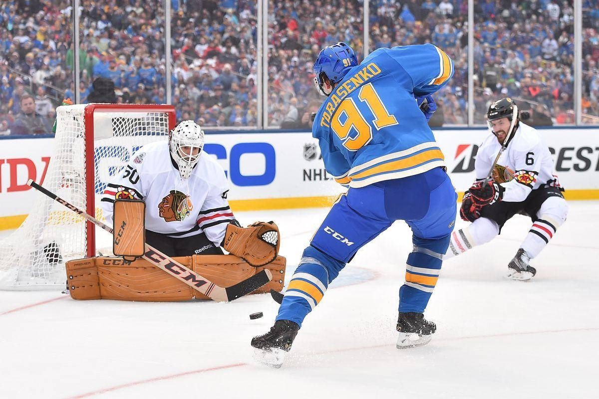 Vladimir Tarasenko Attempts A Goal Against Chicago Blackhawks During Game Wallpaper