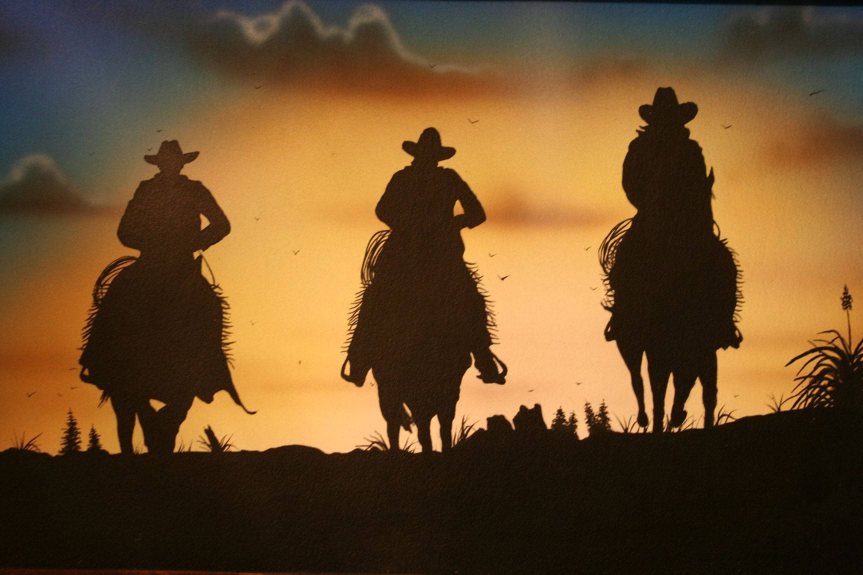 Western Cowboys Riding Sunset Wallpaper