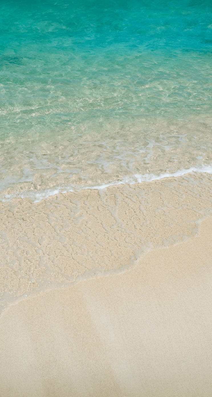 White Sand And Clear Water Ios 7 Wallpaper