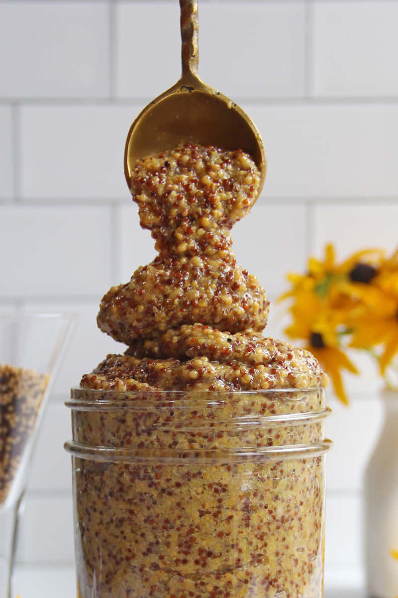 Whole Grain Mustard Overflowing Jar Wallpaper