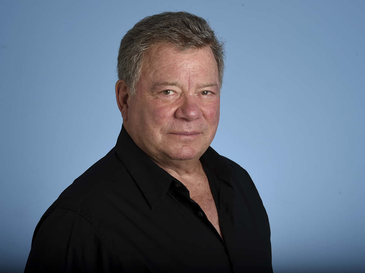 William Shatner Posing In A Casual Outfit Wallpaper