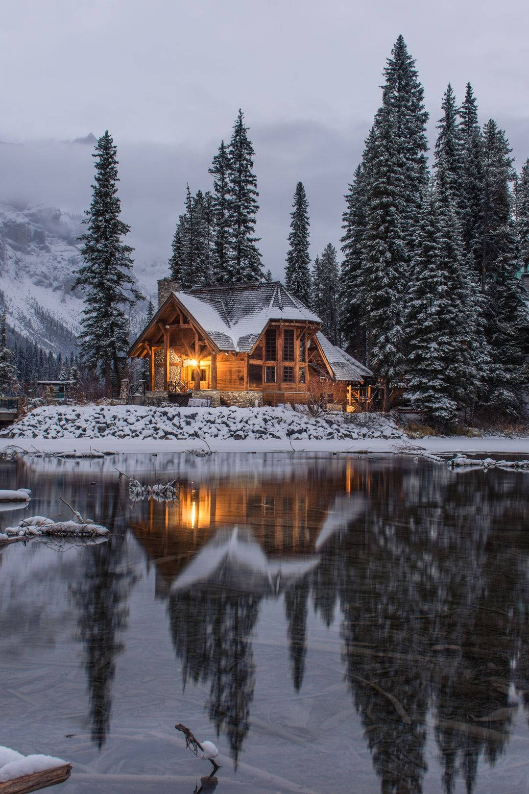 Winter Cabin Reflection Lake Snowy Forest.jpg Wallpaper