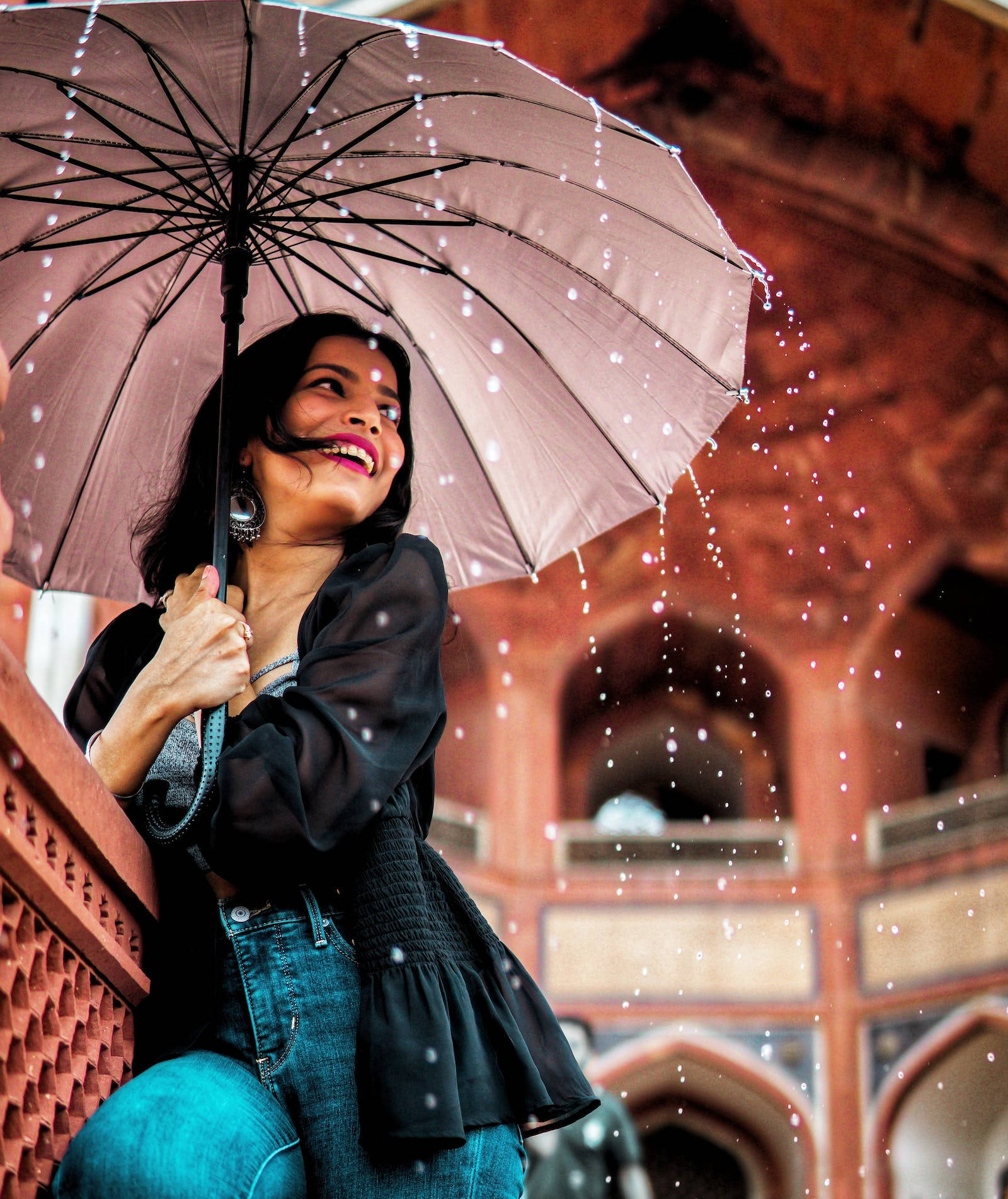 Woman Enjoying While It's Raining Wallpaper