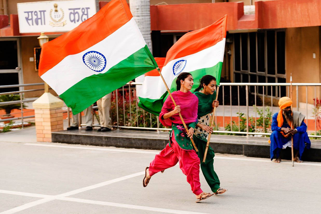 Women Running With The Indian Flag Wallpaper